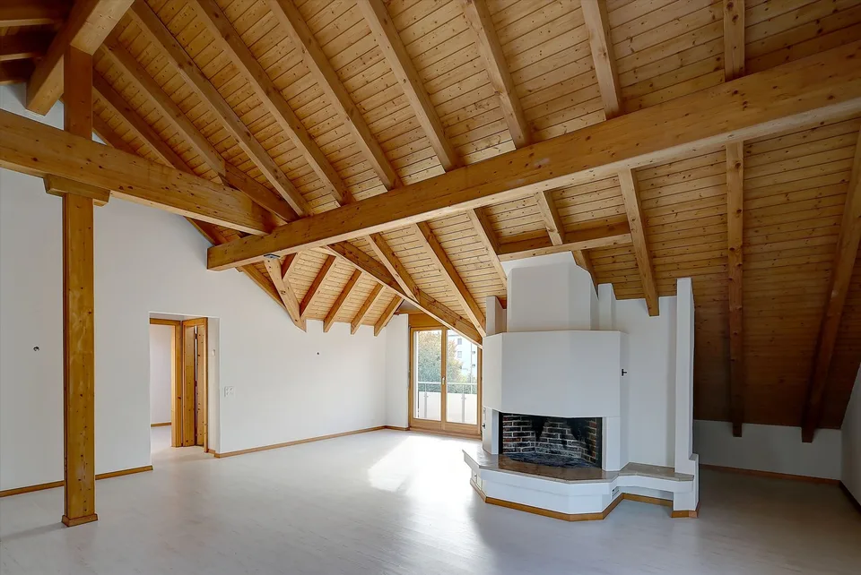 Appartamento mansardato accogliente con caminetto e charme particolare – foto 3 di 11