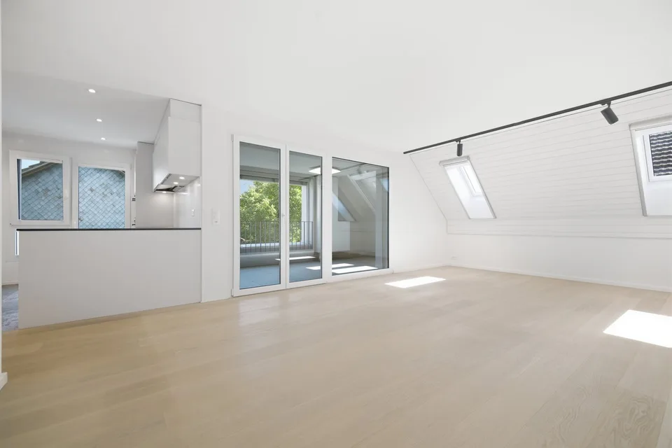 Attractive 3.5-room attic apartment in a quiet location – photo 2 of 13