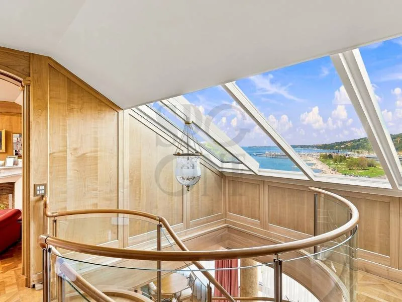 Penthouse duplex affacciato sul lago con terrazza e vista panoramica – foto 8 di 12