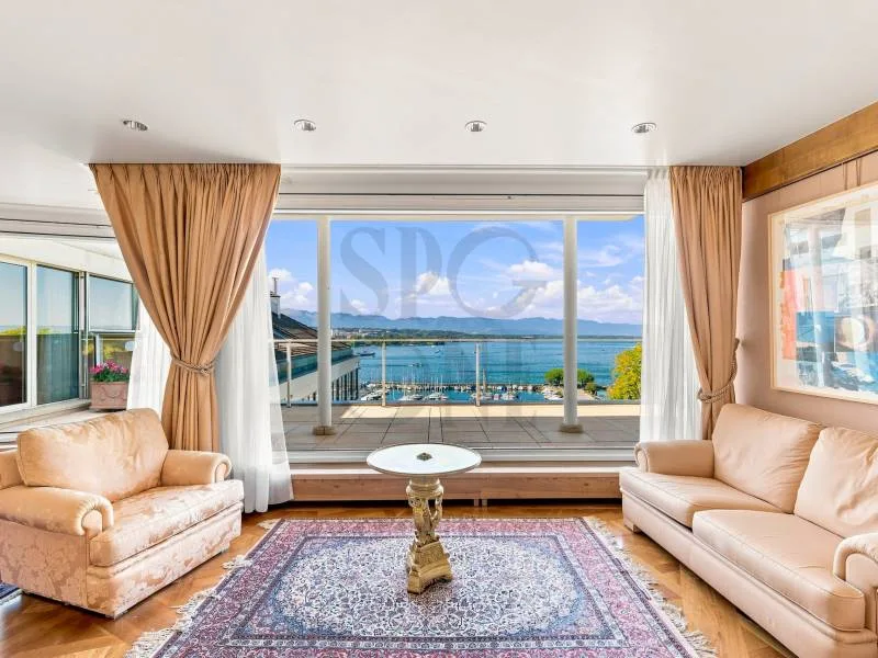 Penthouse duplex affacciato sul lago con terrazza e vista panoramica – foto 4 di 12