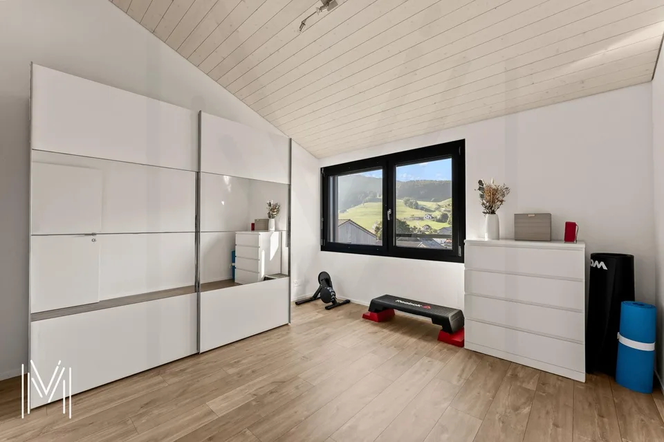 MAGNIFICENT CONTEMPORARY SINGLE-FAMILY HOME WITH 5.5 ROOMS - Wooden architecture, modern comfort, and high quality of life between Fribourg and Bulle – photo 13 of 20