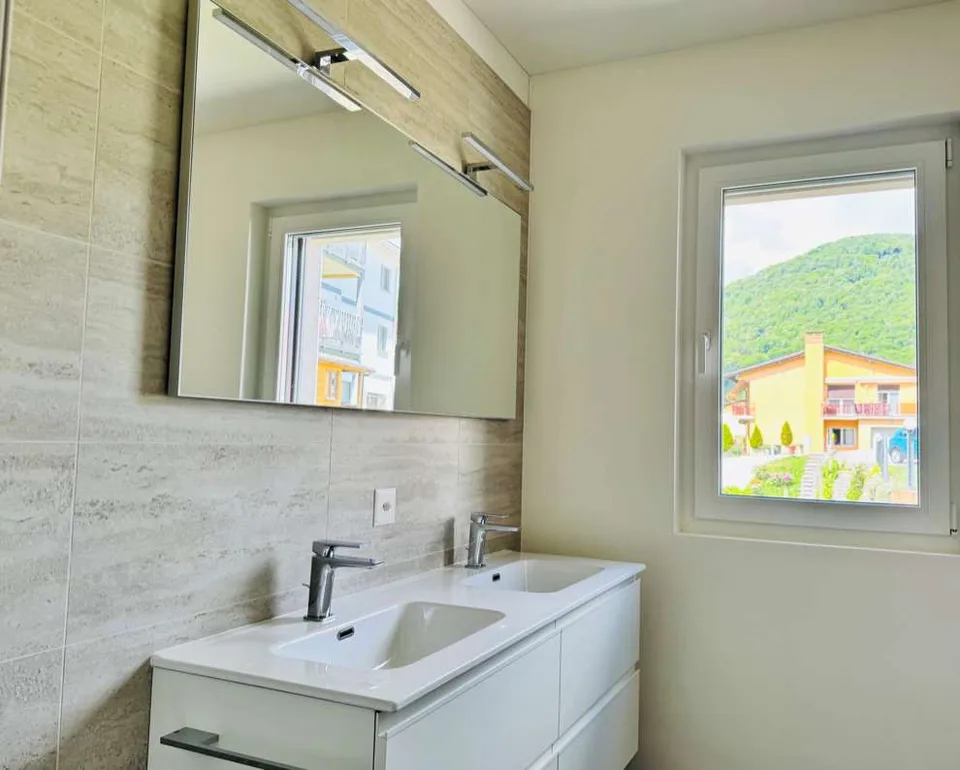 Wohnen in Capriasca: elegantes 4.5-Zimmer-Wohnung mit offenem Blick und viel Licht – Foto 6 von 11
