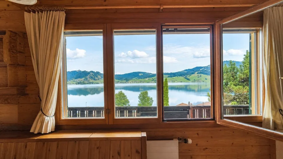 VACATION HOME WITH SENSATIONAL LAKE AND MOUNTAIN VIEWS – photo 7 of 13