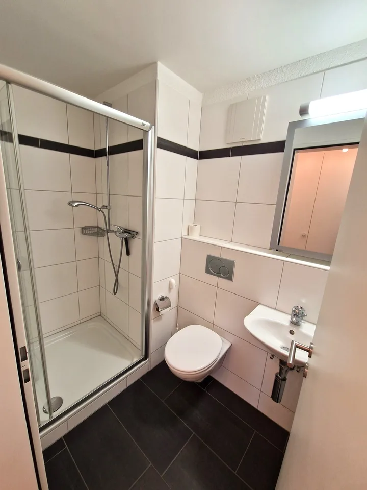 Appartement attractif de 4,5 pièces avec balcon et espace hobby/laverie privé – photo 13 sur 30