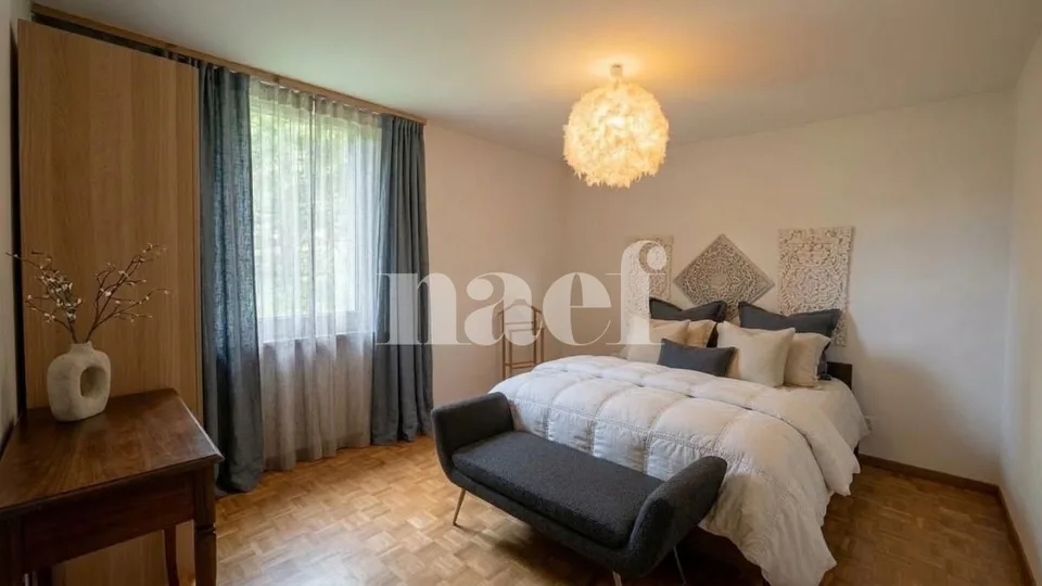 Appartement de 5.5 pièces au rez-de-chaussée avec cheminée et balcon – photo 4 sur 9