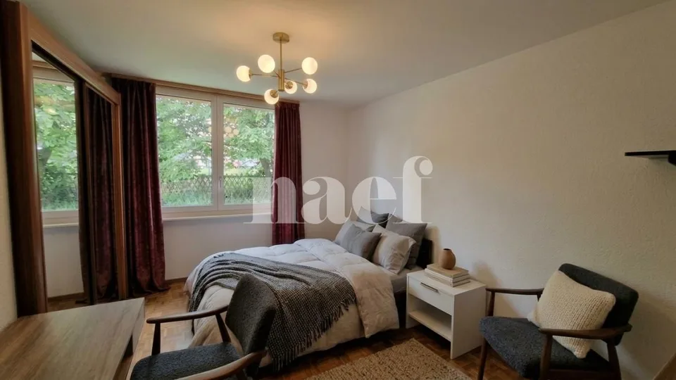 Appartement de 5.5 pièces au rez-de-chaussée avec cheminée et balcon – photo 5 sur 9