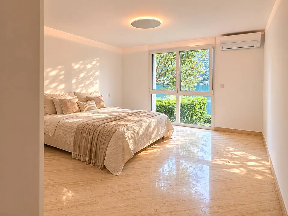 Duplex esclusivo con giardino privato e vista lago – Foto 9 von 13