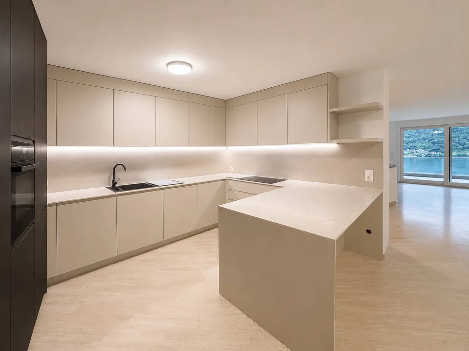 Duplex esclusivo con giardino privato e vista lago – Foto 12 von 13