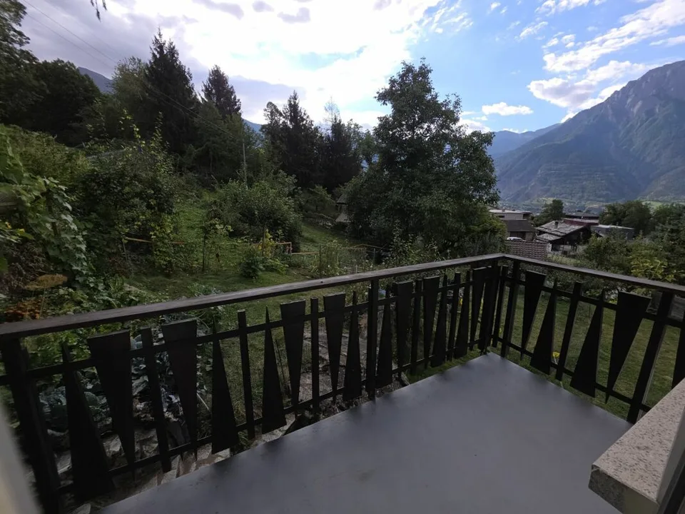 Maison avec 3 appartements et garage double – photo 10 sur 13