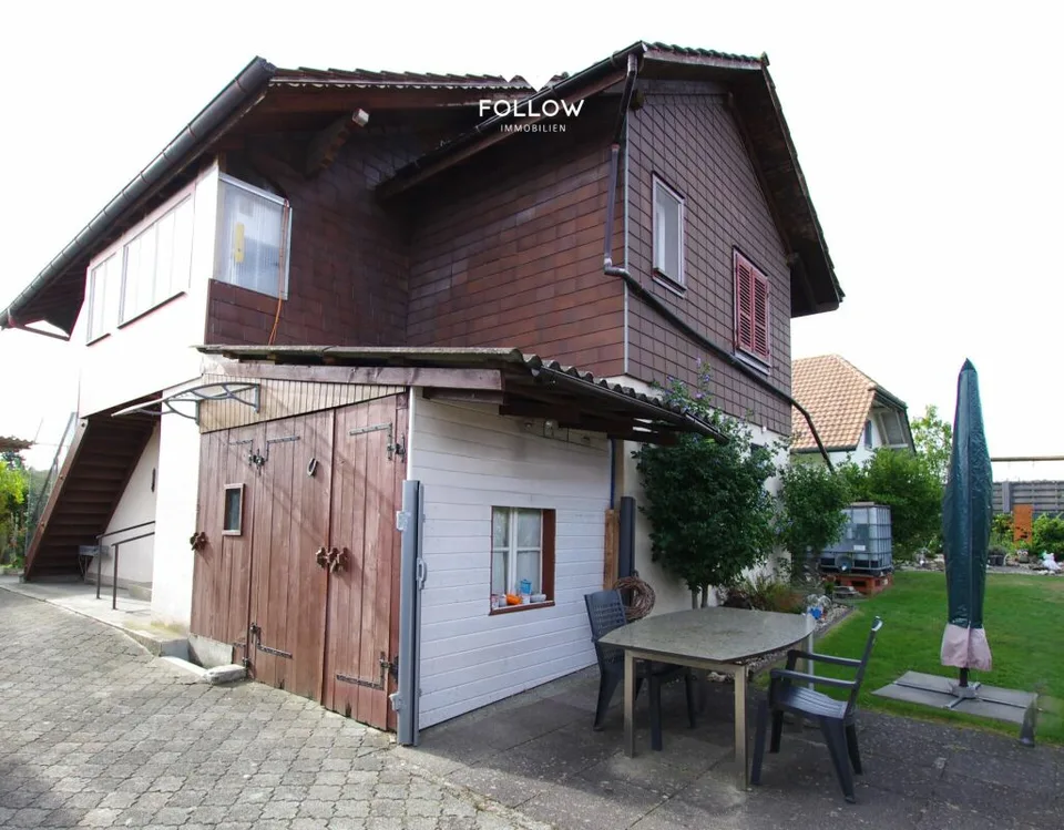 Family-friendly residential building with 2 apartments, large garden, plenty of space and expansion potential – photo 9 of 12