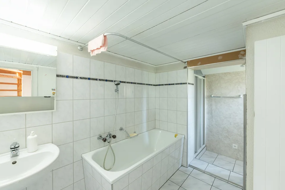 Casa multifamiliare con potenziale – foto 5 di 7
