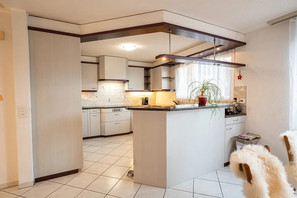 Casa multifamiliare con 3 unità e giardino in vendita a Kirchdorf – foto 12 di 13