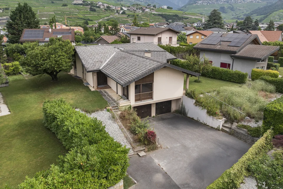 Una villa con bei volumi su quasi 1'000 m² – foto 12 di 12