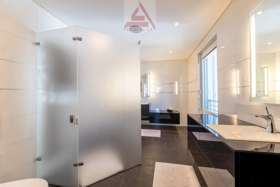 Prestigioso attico di 5.5 locali vista lago/Prestigioses 5.5-Zimmer-Attika mit Seeblick – photo 8 sur 13