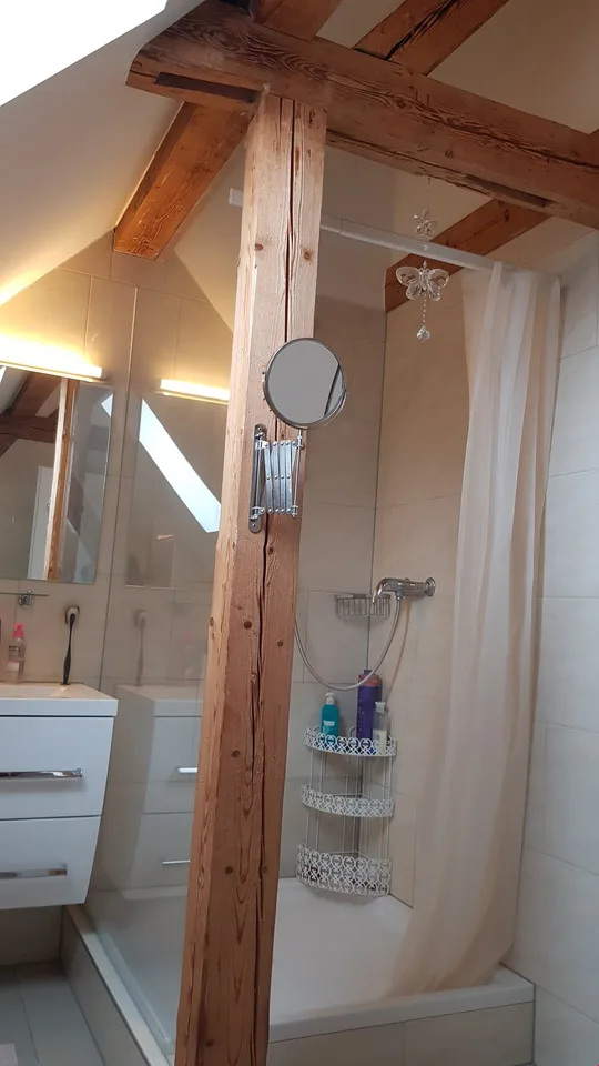Beautiful 2.5-room attic apartment in a small 3-family house for rent – photo 10 of 13