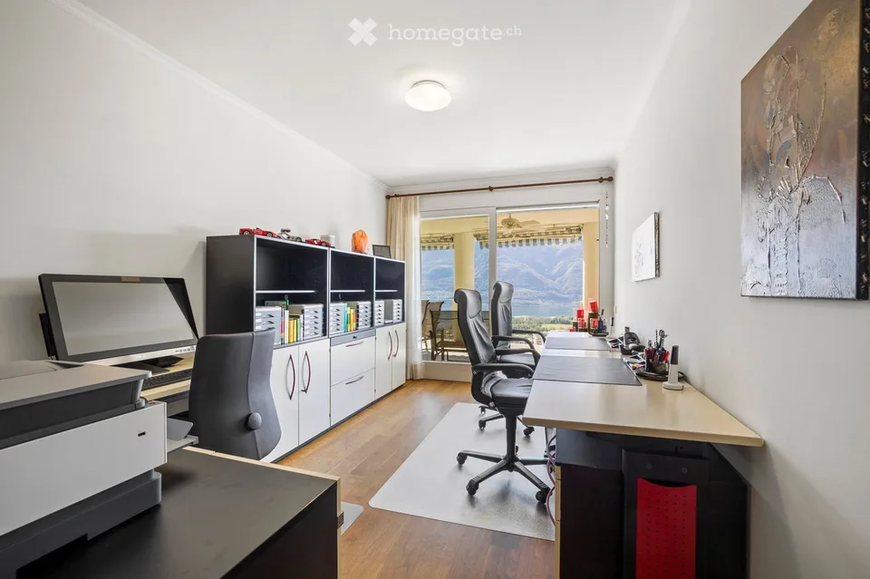 Appartamento in attico a Orselina con vista diretta sul lago Maggiore – foto 26 di 30