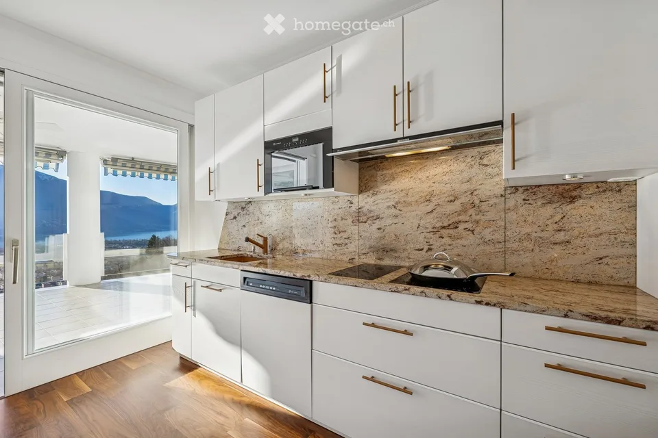 Appartamento in attico a Orselina con vista diretta sul lago Maggiore – foto 19 di 30