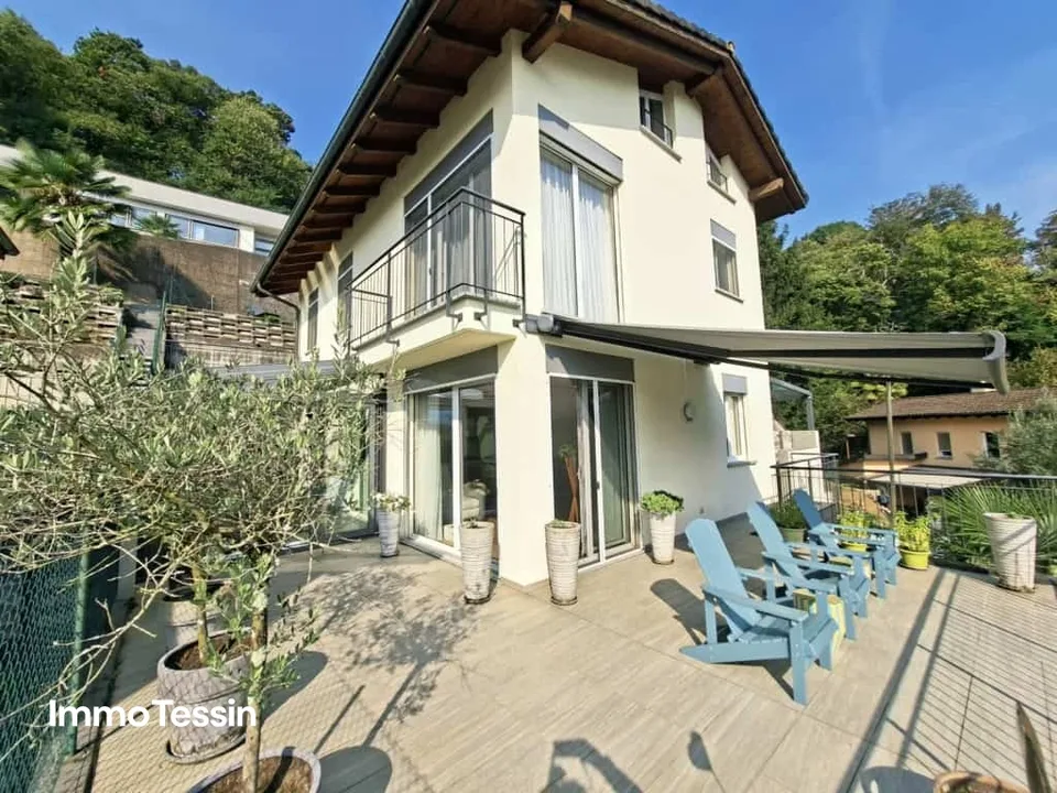 Belle villa à Caslano avec un design moderne, une ambiance élégante et beaucoup d'espace ainsi que 6 places de parking – photo 6 sur 13