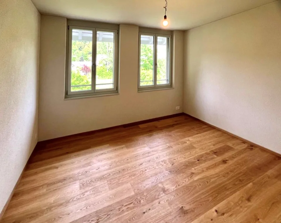 Modern 7.5-room semi-detached house embedded in the Suterguet Gränichen – photo 8 of 21