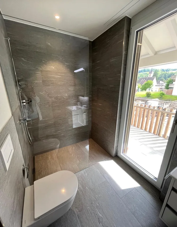 Modern 7.5-room semi-detached house embedded in the Suterguet Gränichen – photo 12 of 21