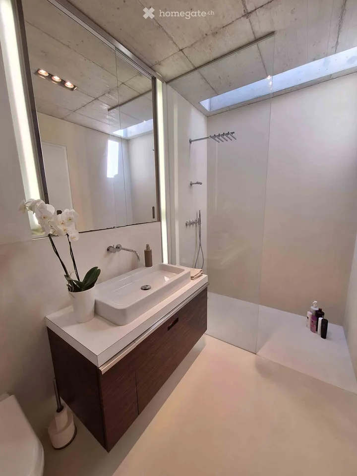 Appartement d'attique exclusif à Forch – Architecture, vue panoramique et intimité – photo 15 sur 21