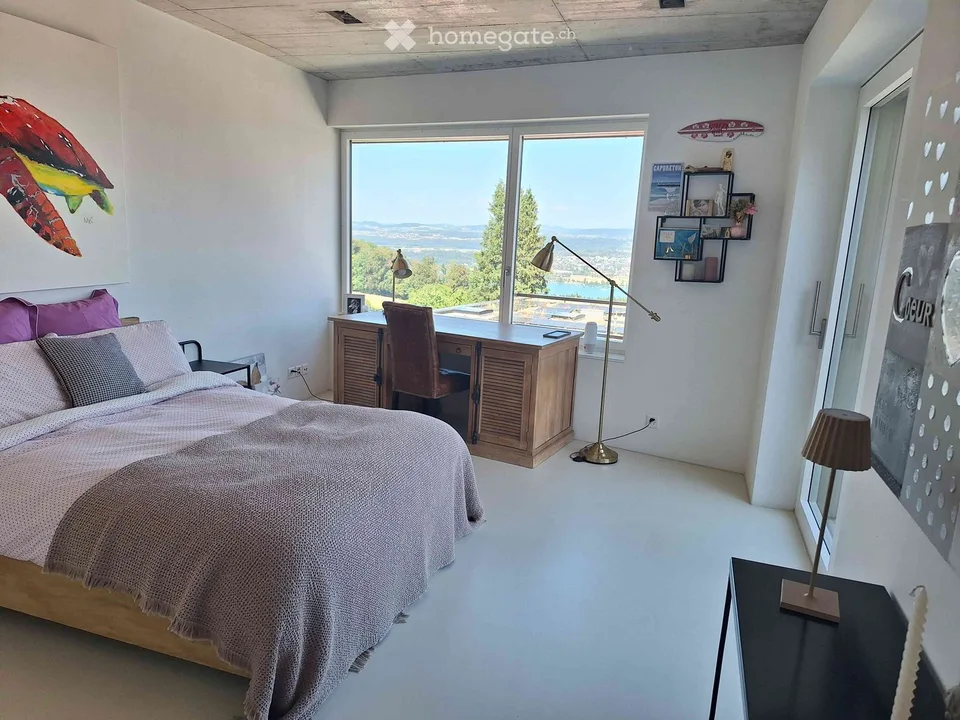 Appartement d'attique exclusif à Forch – Architecture, vue panoramique et intimité – photo 9 sur 21