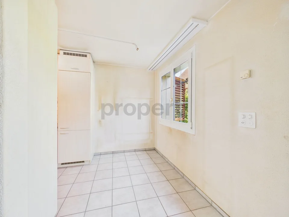 Cozy 3.5-room garden apartment with fireplace and design potential – photo 24 of 29