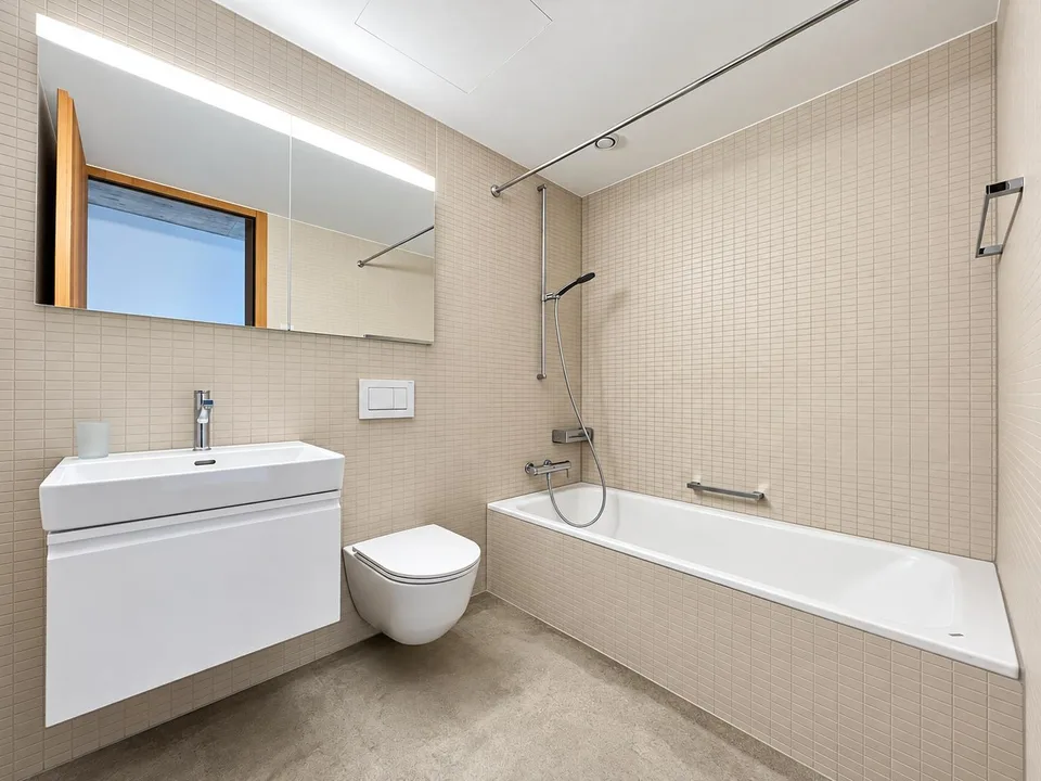 Modern concrete-style apartment near Spalentor – photo 7 of 10