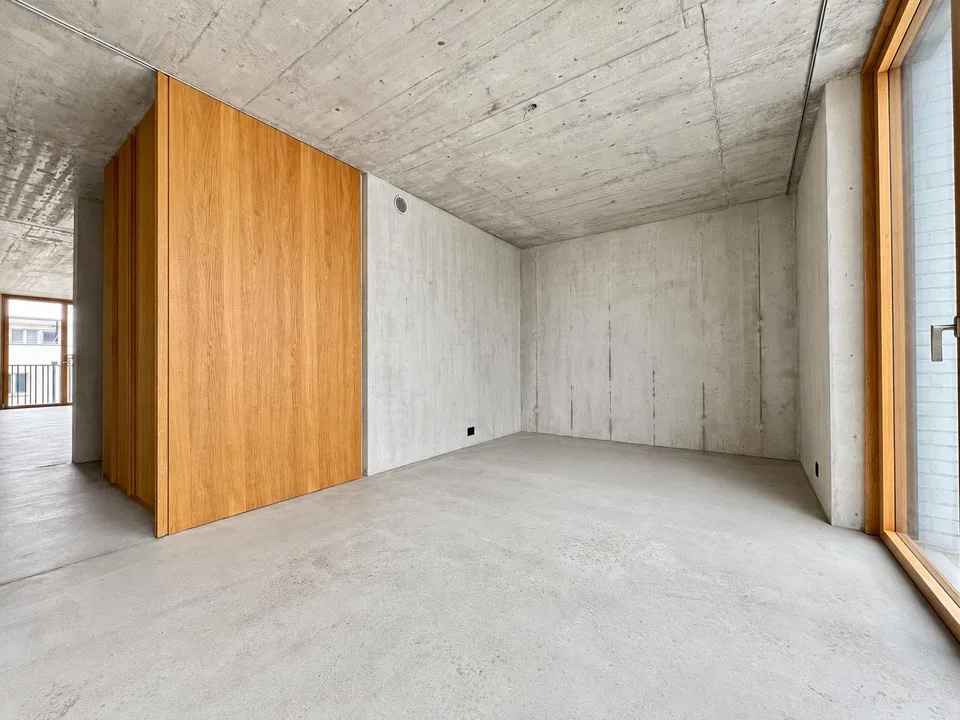 Modern concrete-style apartment near Spalentor – photo 6 of 10