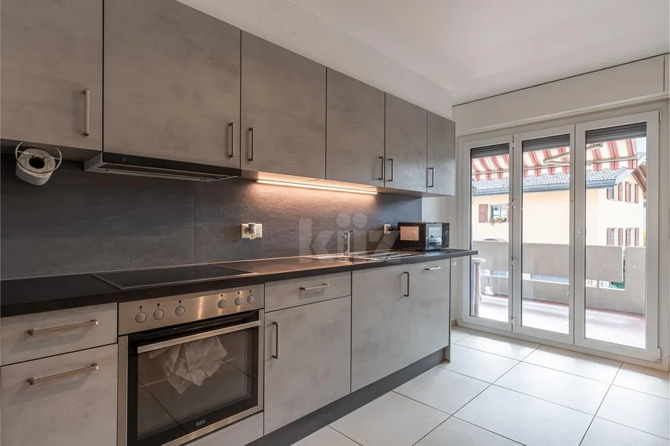 Bel appartement traversant avec balcon et vue dégagée – photo 4 sur 13