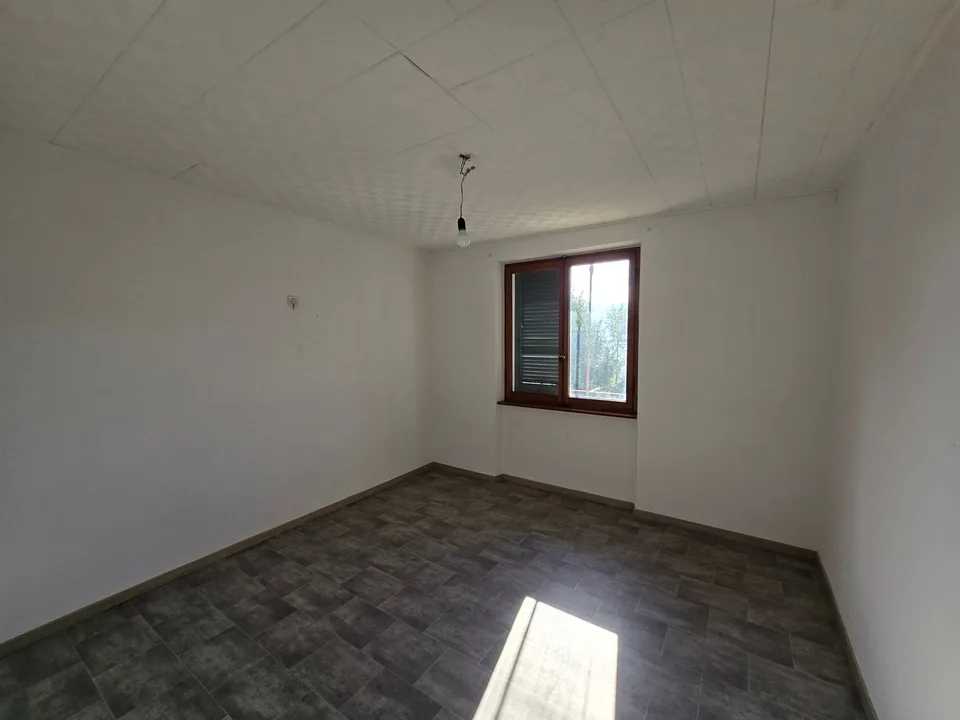 Grande proprietà con vista lago panoramica e terreno edificabile – Foto 12 von 24