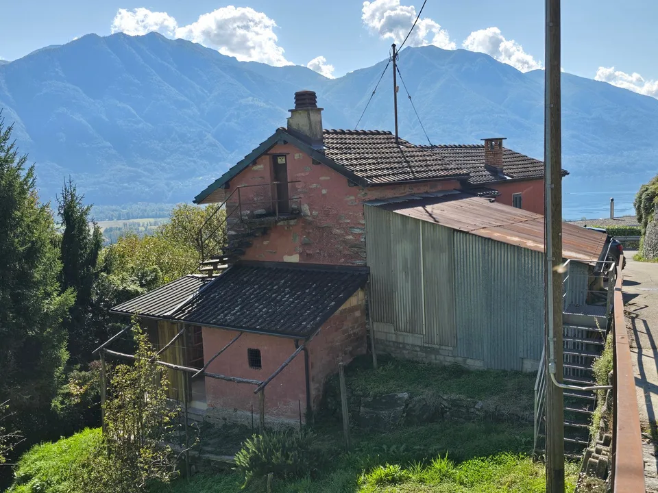 Grande proprietà con vista lago panoramica e terreno edificabile – Foto 7 von 24