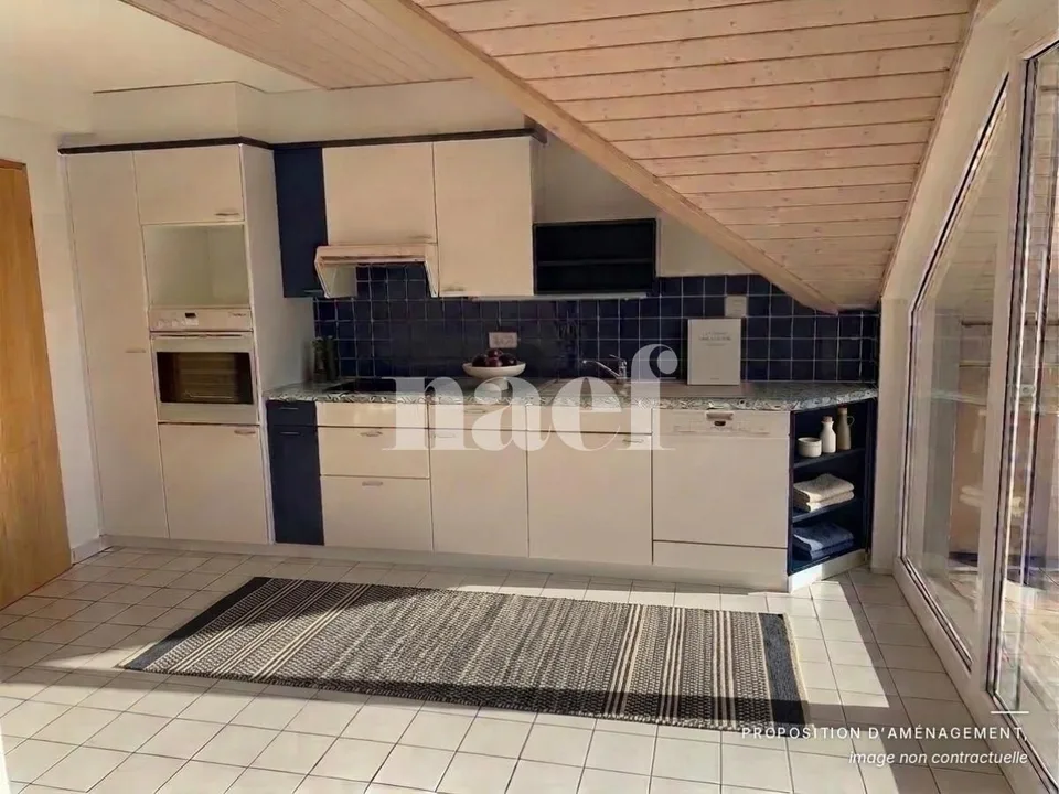Im Zentrum des Dorfes - Schöne 5.5-Zimmer-Wohnung im Dachgeschoss mit Kamin und großem Balkon – Foto 2 von 9