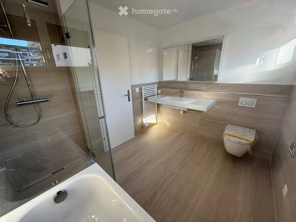 Erstbezug einer umfassend renovierter, zentral gelegener Wohnung in Wollerau – Foto 4 von 10