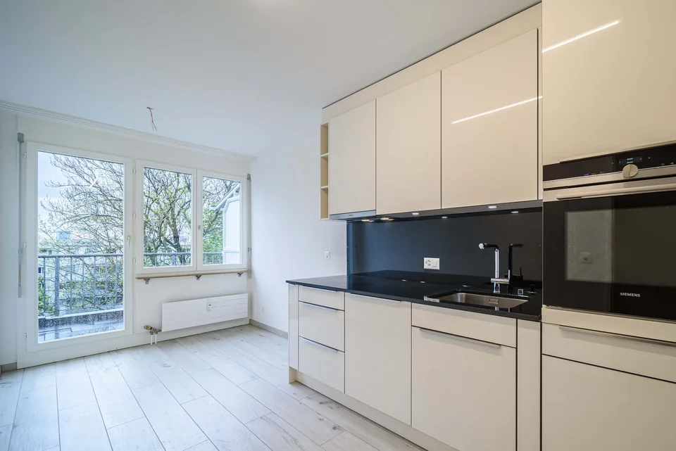Renovated 2.5-room apartment in Basel with private garden – photo 2 of 25
