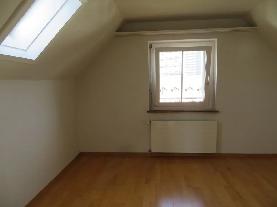 Charmant appartement mansardé à louer – photo 6 sur 10