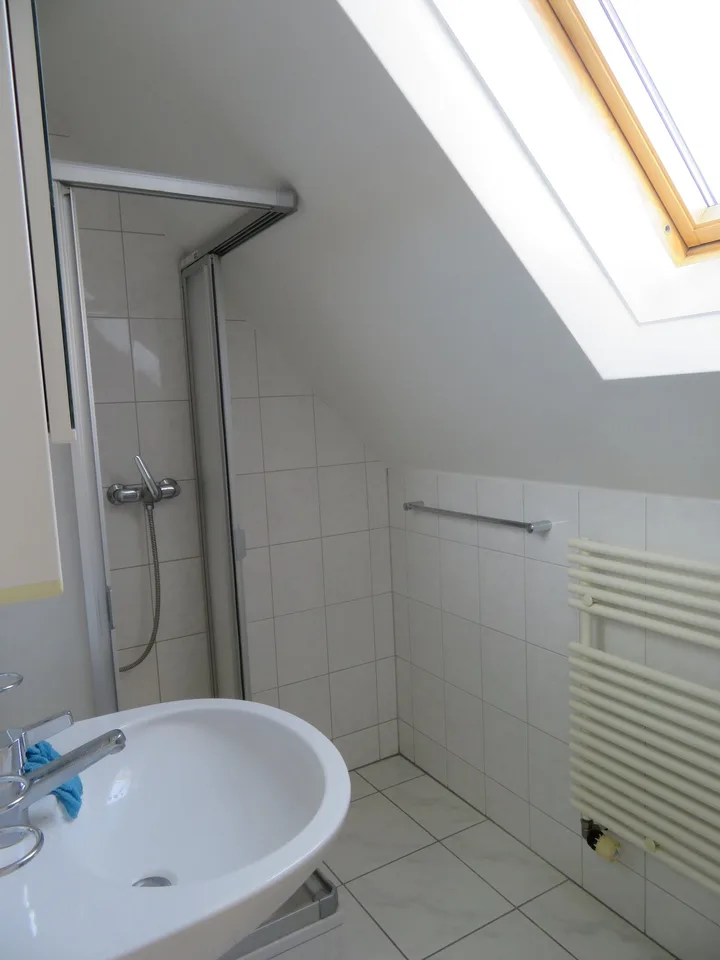 Charmant appartement mansardé à louer – photo 3 sur 10