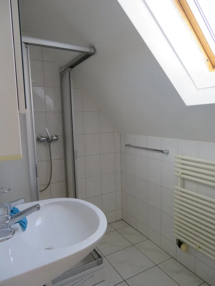 Charmant appartement mansardé à louer – photo 4 sur 10