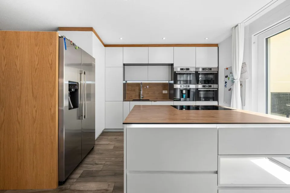 Casa a schiera di 6,5 locali con appartamento di 3,5 locali separato al piano superiore – foto 5 di 21