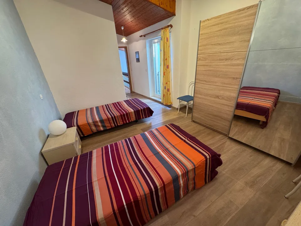 Duplex en location avec 2 chambres et bureau – Cadro – photo 9 sur 25