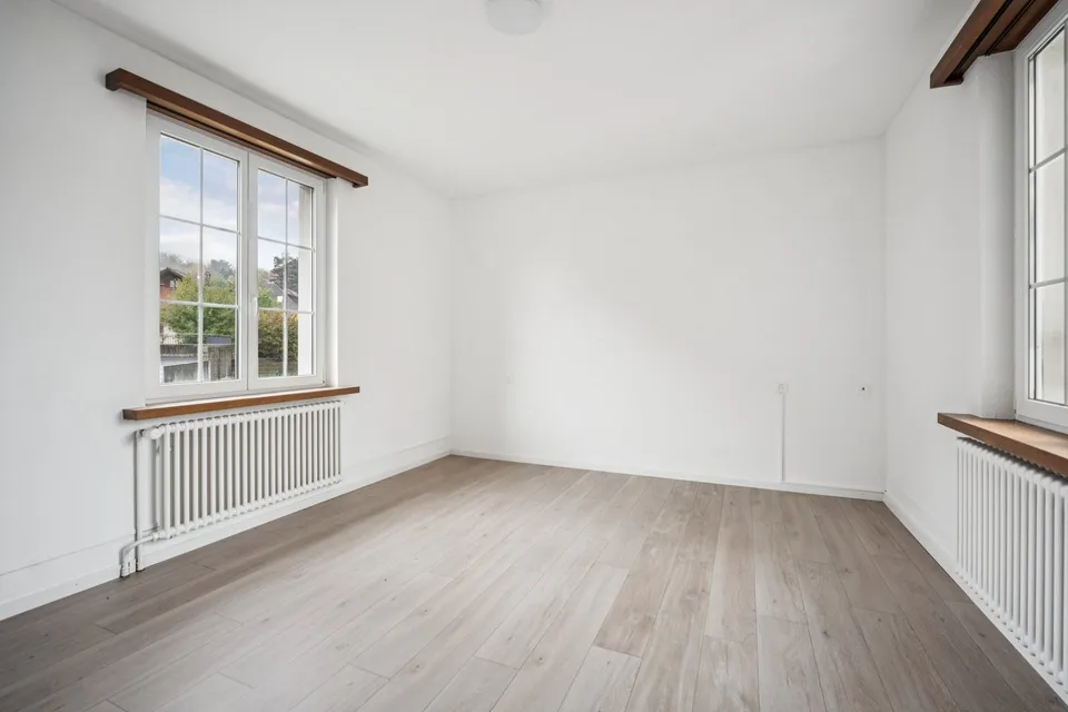 Casa multifamiliare con locale commerciale e potenziale di sviluppo – foto 4 di 8