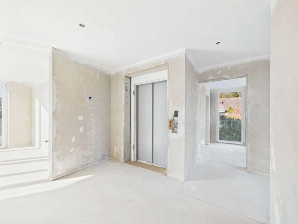 Exclusive attic apartment with a far-reaching view – photo 8 of 14