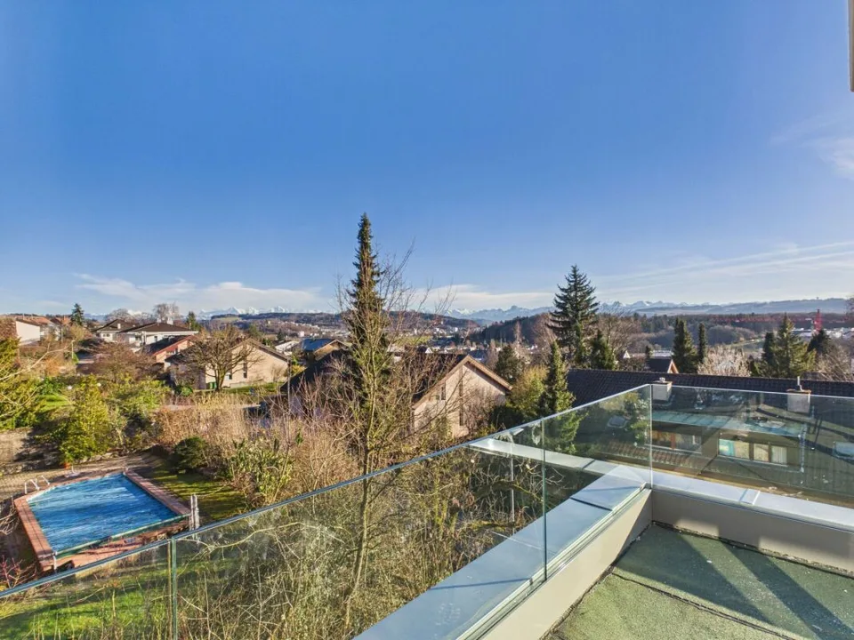 Exclusive attic apartment with a far-reaching view – photo 14 of 14