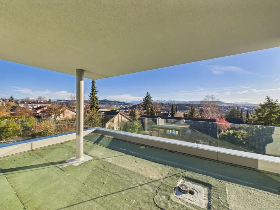 Exclusive attic apartment with a far-reaching view – photo 11 of 14