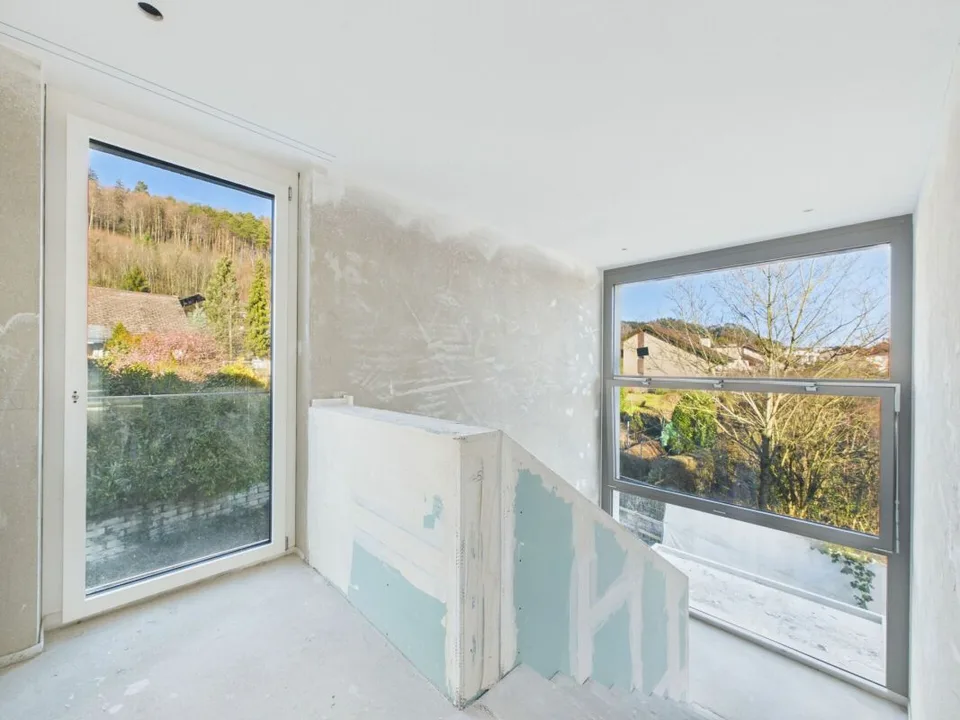 Exclusive attic apartment with a far-reaching view – photo 10 of 14