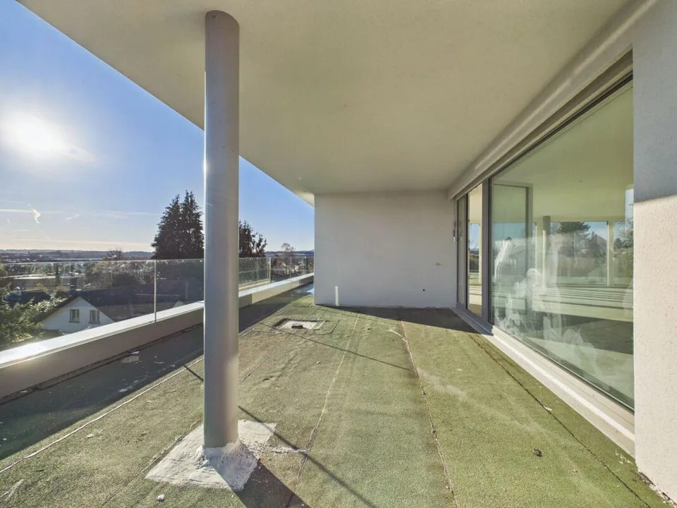 Exclusive attic apartment with a far-reaching view – photo 13 of 14