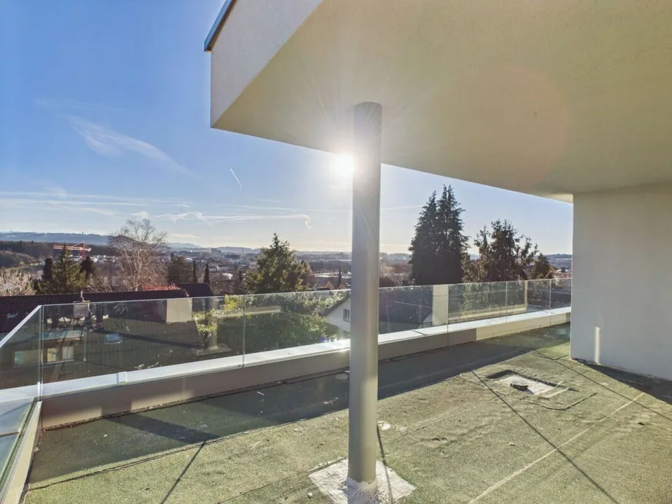 Exclusive attic apartment with a far-reaching view – photo 12 of 14