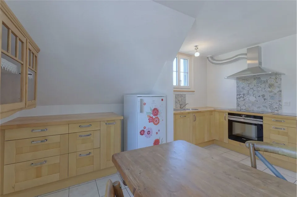 Charmante 3½-Zimmer Eigentumswohnung mit Mansardenzimmer und Garten – Foto 11 von 13