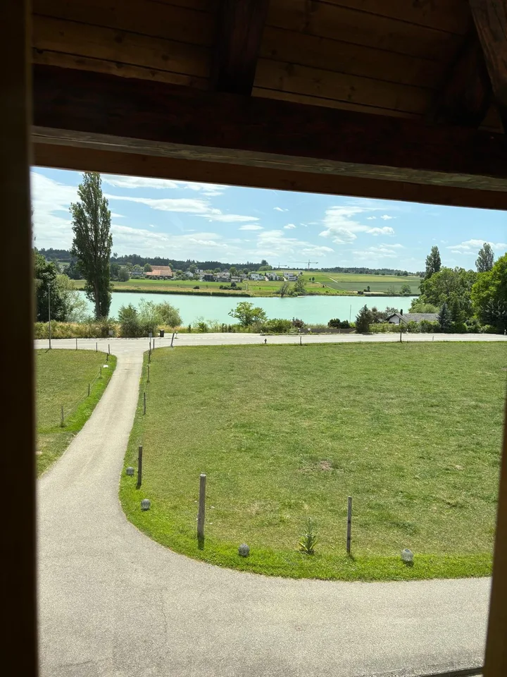 Charming attic apartment with lake view – photo 2 of 7