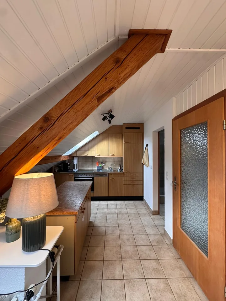 Charming attic apartment with lake view – photo 3 of 7
